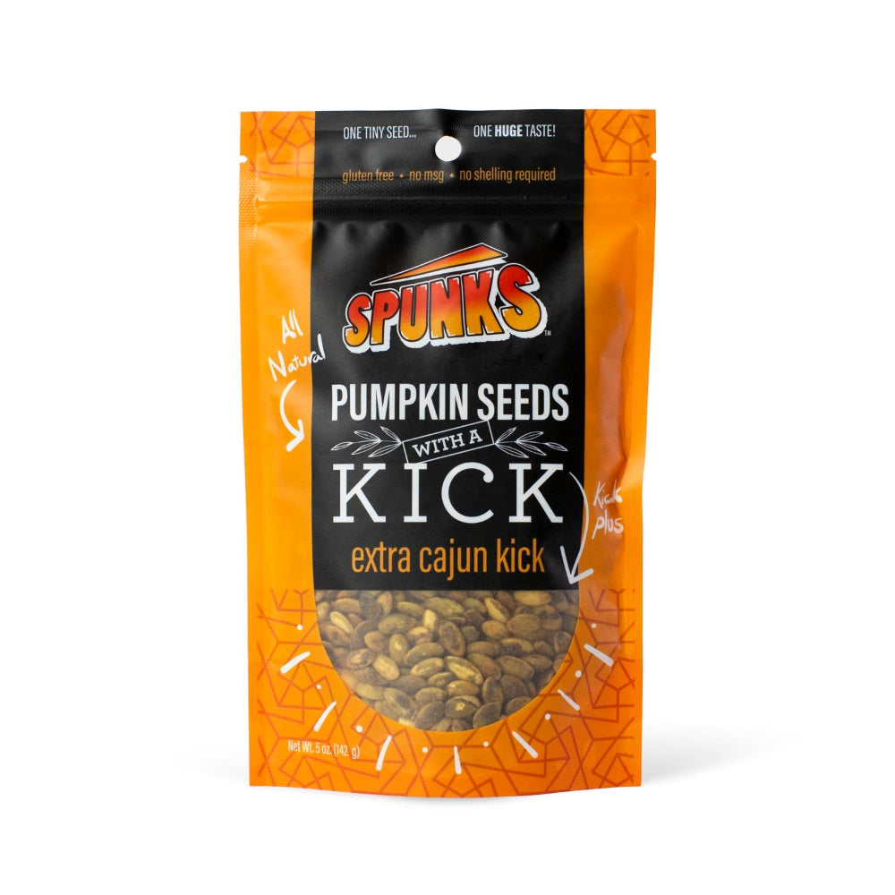 Orange bag with black label that says "SPUNKS PUMPKIN SEEDS WITH A KICK extra cajun kick